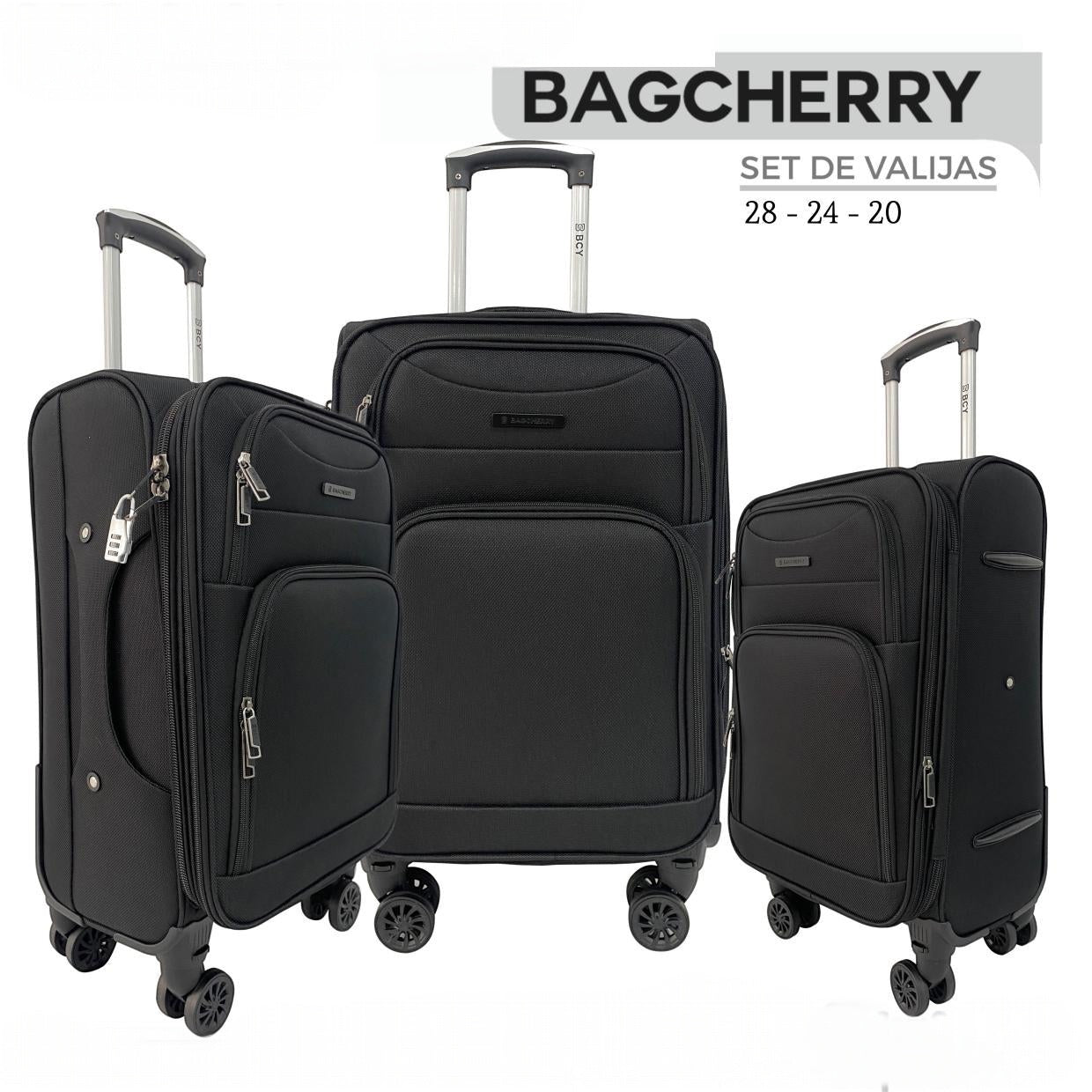 Mumma Accesorios de Moda set of three black fabric suitcases with telescopic handles and spinner wheels