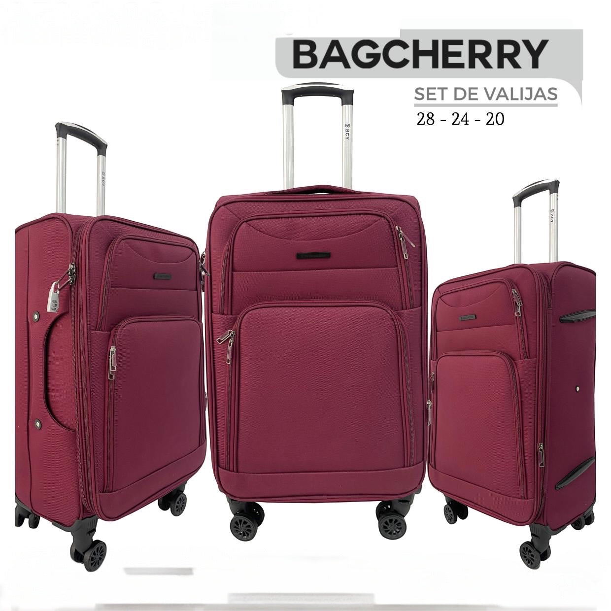 Mumma Accesorios de Moda set of three burgundy fabric suitcases in 28, 24, and 20 inch sizes with spinner wheels.