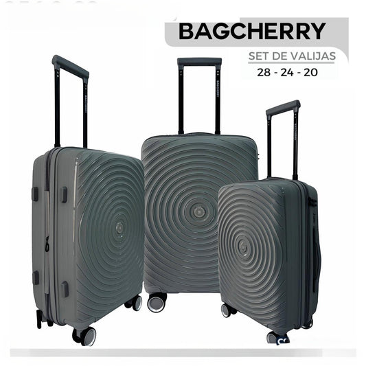 Mumma Accesorios de Moda set of 3 green polypropylene hard-shell suitcases with 360-degree wheels and handles.