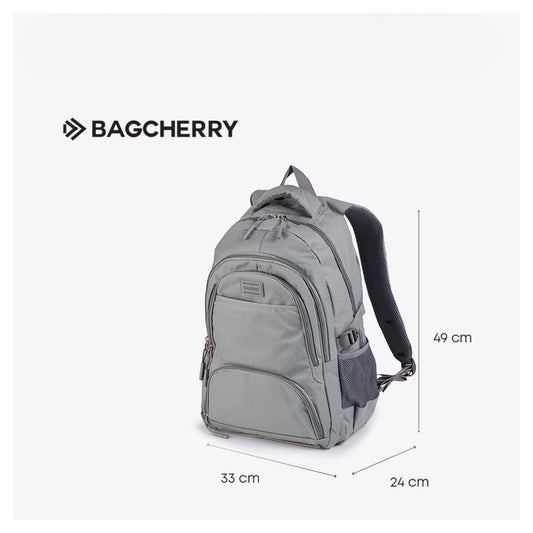Mumma Accesorios de Moda Neblina grey urban backpack with laptop compartment, multiple pockets, and bottle holder.