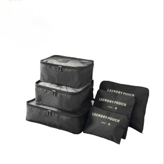 Mumma Accesorios de Moda travel packing cubes set in various sizes with zippers, handles, and laundry pouches.